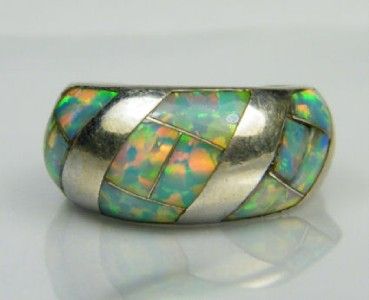 IN THIS AUCTION a pre owned unsigned sterling silver and opal inlaid 