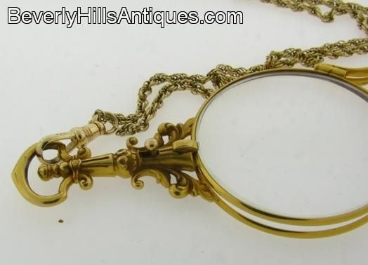   Gold Lorgnette With Garnet Slide Chain 32.9 Grams 29 Inch Chain  