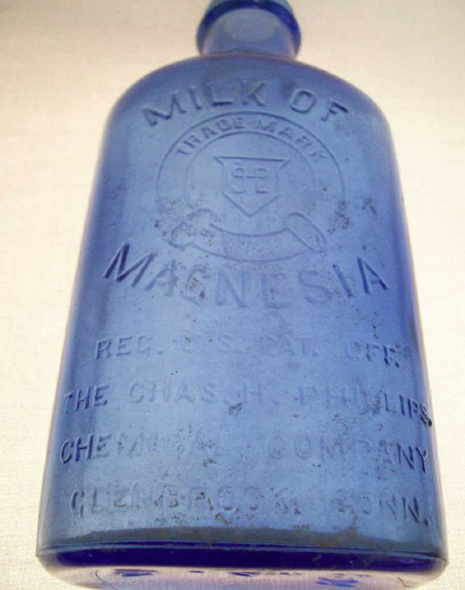 Vintatge Blue Milk Of Magnesia Embossed Bottle  