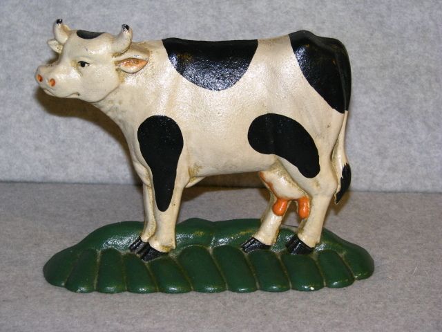 Vintage Used Cast Iron Cow Door Stop  