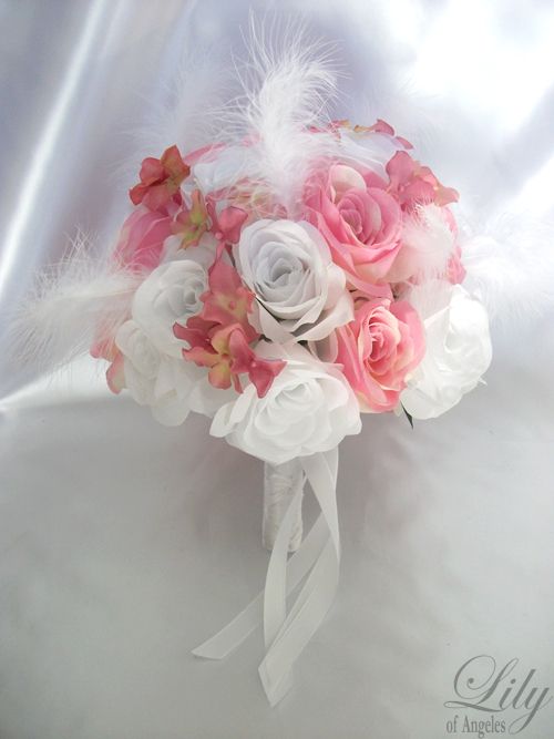 are made with one white rosebud accented with mauve hydrangeas